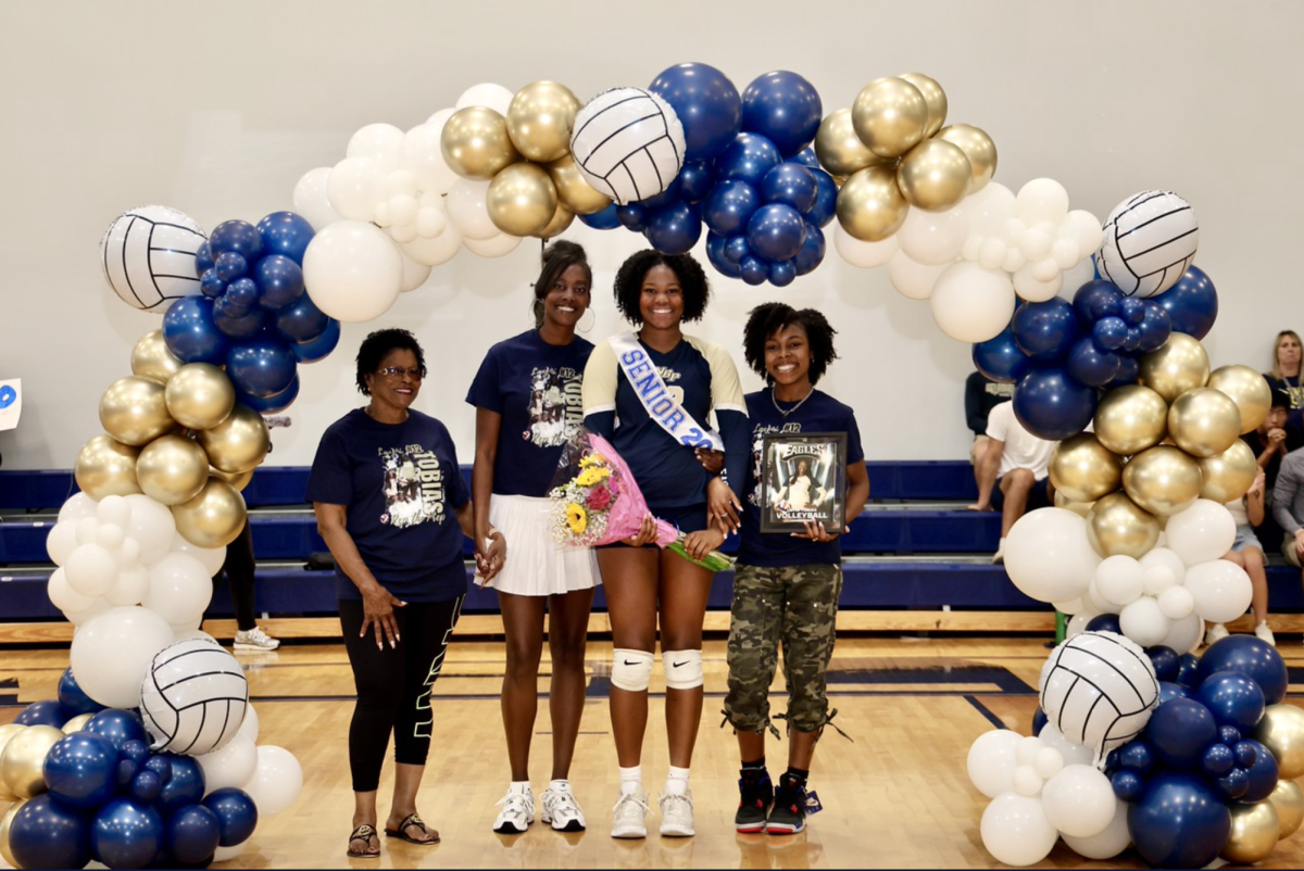 Tobias at Senior night with family.